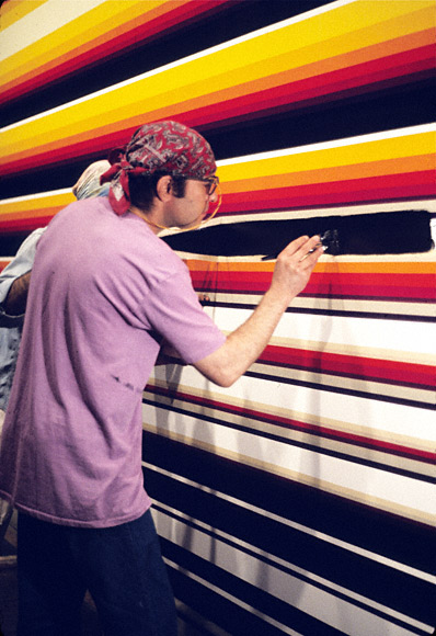 Norman Zammitt executing his painting North Wall, 1976. Acrylic on canvas. 96 x 168 in. Collection of Leon Gazarian & Monique Powell. © Norman Zammitt Estate